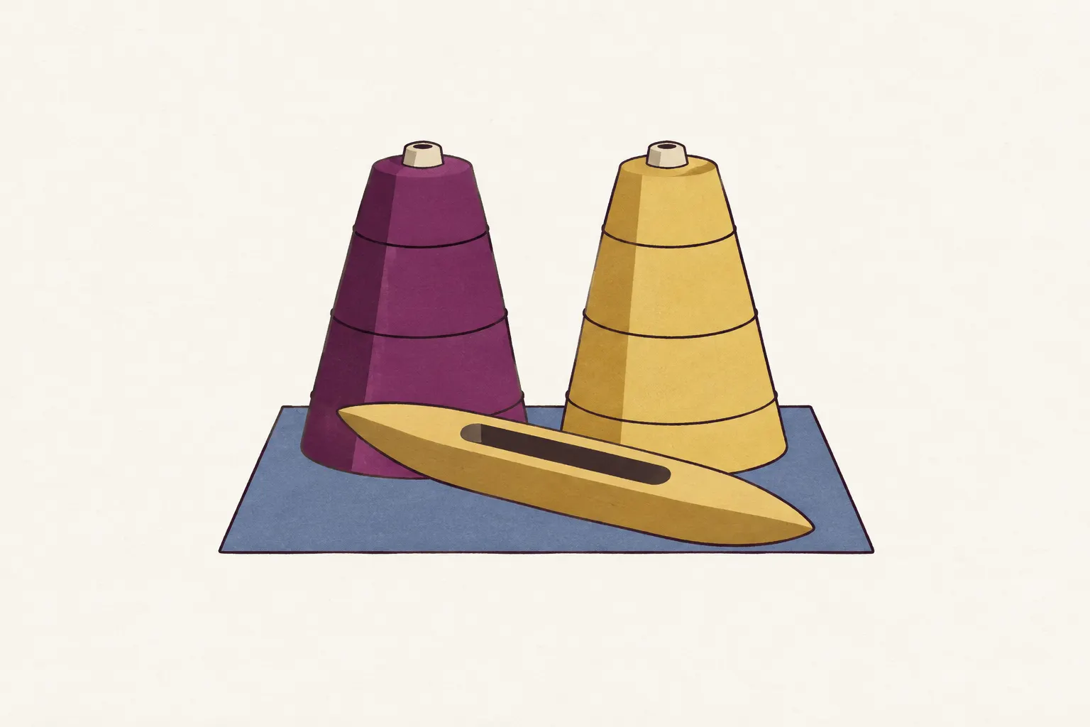 Two yarn cones, one dark and one light, beside a wooden shuttle on a workbench