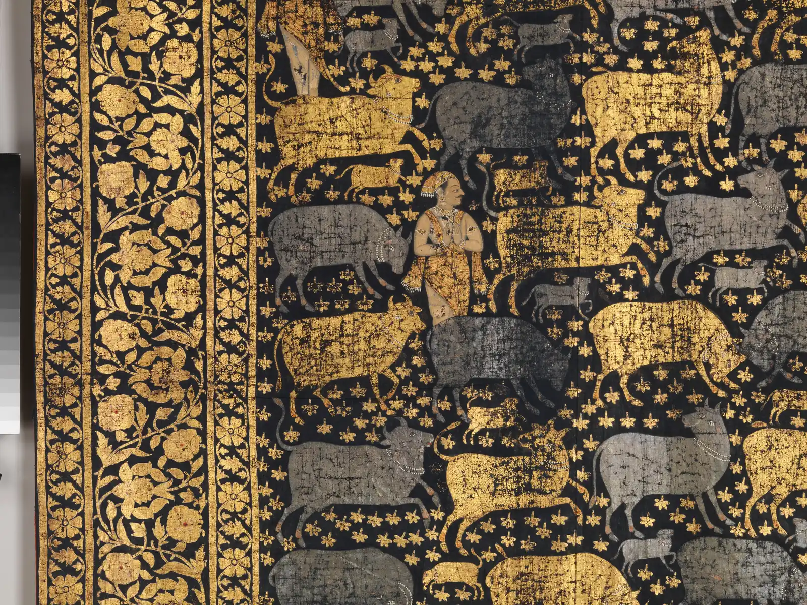 Detail of a late 18th-century Indian ceremonial cloth: gold and silver cows on cotton catalogued as indigo-dyed, Met 2003.177
