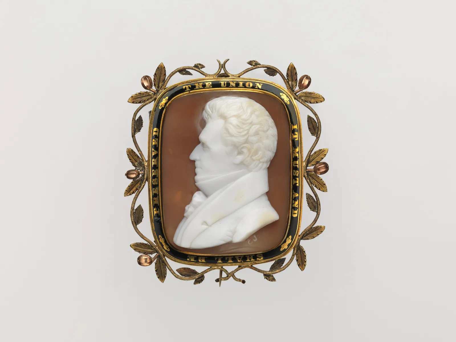 Shell cameo brooch, white profile on a brown ground, gold and black enamel frame; American, c. 1835; The Met 2000.562